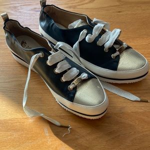 XSA women’s navy and metallic gold, leather sneaker size 39, slight wedge heel.